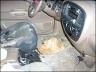 inside view of car damaged by rock