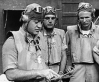 Major Pappy Boyington (far left) briefs his men before combat