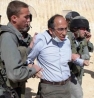 Salem-News.com writer, Professor Mazin Qumsiyeh, a former Duke and Yale professor, is hauled away by Israeli soldiers for taking part in a peace demonstration.