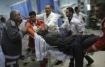 Palestinian is carried into al-Aqsa Martys Hospital in Gaza wounded by Israeli troops