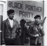 1960s photo of Black Panther founder Huey Newton, right, with Black Panther Party co-founder Bobby Seale.
