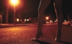 ladies legs on a dark street