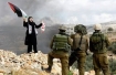 Palestinian woman confronts Israeli soldiers