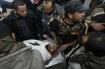 The body of one of the five victims of the December 18 attack was taken to a morgue.