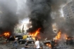 Residents gather at the site of an explosion in Beirut's southern suburb neighbourhood of Bir al-Abed on July 9, 2013 (AFP Photo / Str) 