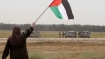 Israeli soldier and Palestinian squared off