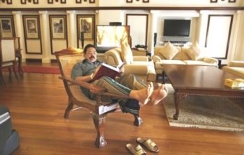 Rajapaksa relaxing in his reading room.