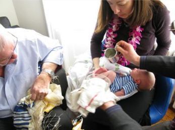 At the Bris Shalom, the parents washed their son's feet (Brit Rechitzah) as a symbolic sign of Jewish covenant 