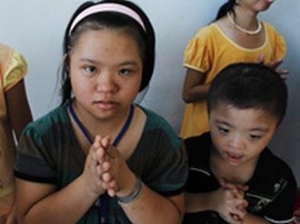 Agent Orange victims are seen at a hospice in Vietnam's central Da Nang City June 16.