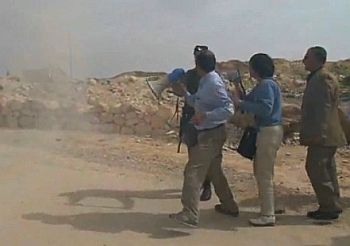 Israeli soldier shoving Dr. Mazin Qumsiyeh