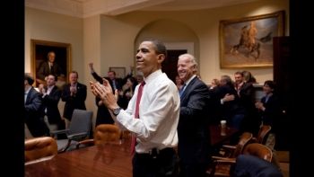 President Barack Obama, Vice President Joe Biden, and senior staff, react in the Roosevelt Room of the White House, as the House passes the health care reform bill,, March 21, 2010