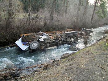 Loaded log truck crash 3-23-14