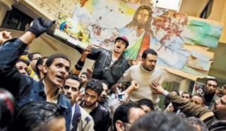 Coptic Christians praying in January after a bombing in an Alexandria church