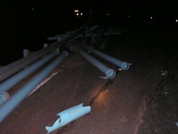 Photo of pipe strewn across the lanes of Highway 22E in Oregon 5-6-08