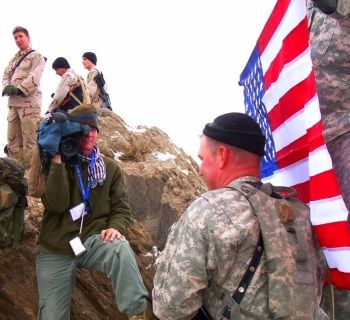 Tim King videotapes Major Arnold Strong, on the Ghar Mountain outside Kabul, Afghanistan.