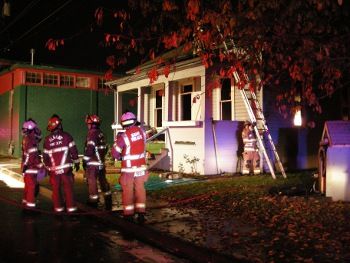 Albany Fire Fighters assess fire suppression efforts