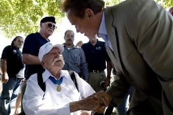 Governor Arnold Schwarzenegger joined Assemblymember Paul Cook sign AB 717