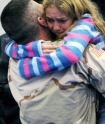 Sarah White, 11, hugs her father Sgt. Brian White of Trout Lake april 6 2006