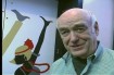 Roger Yost with some of the Reed`s new mural artwork