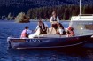 people on small boat