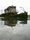 fishing boat from another era is North of Gold Beach, Oregon