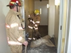 Fire fighters after the Lottery building fire was extinguished.